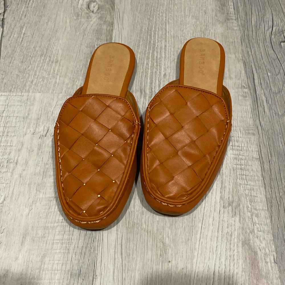 Mule. Never worn.